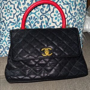 Elegant Black Quilted Satchel with Red